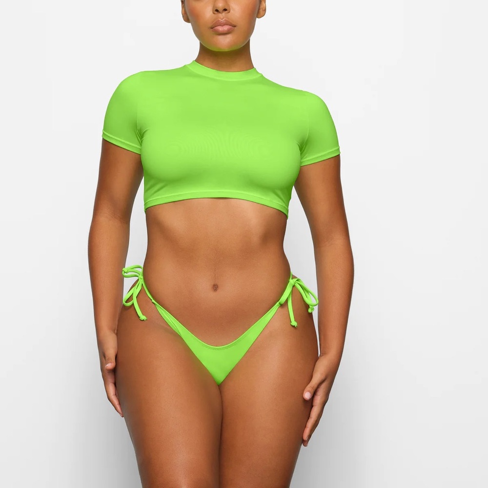 #56. NWT Recycled Swim T-Shirt